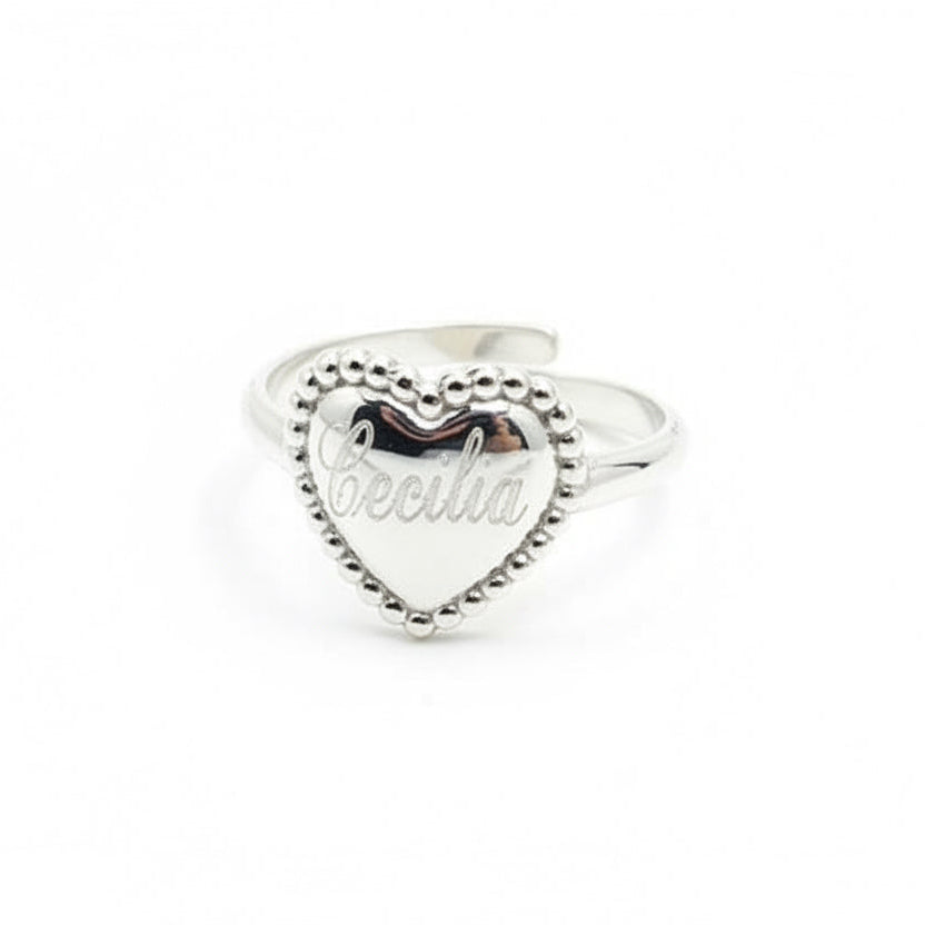 Anello cuore borchiato inciso