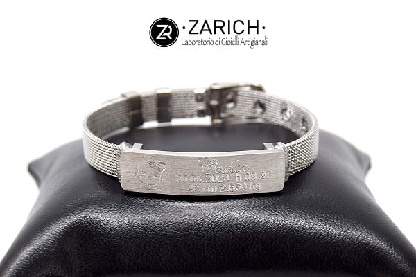 Strap bracelet with engraved birth data plate