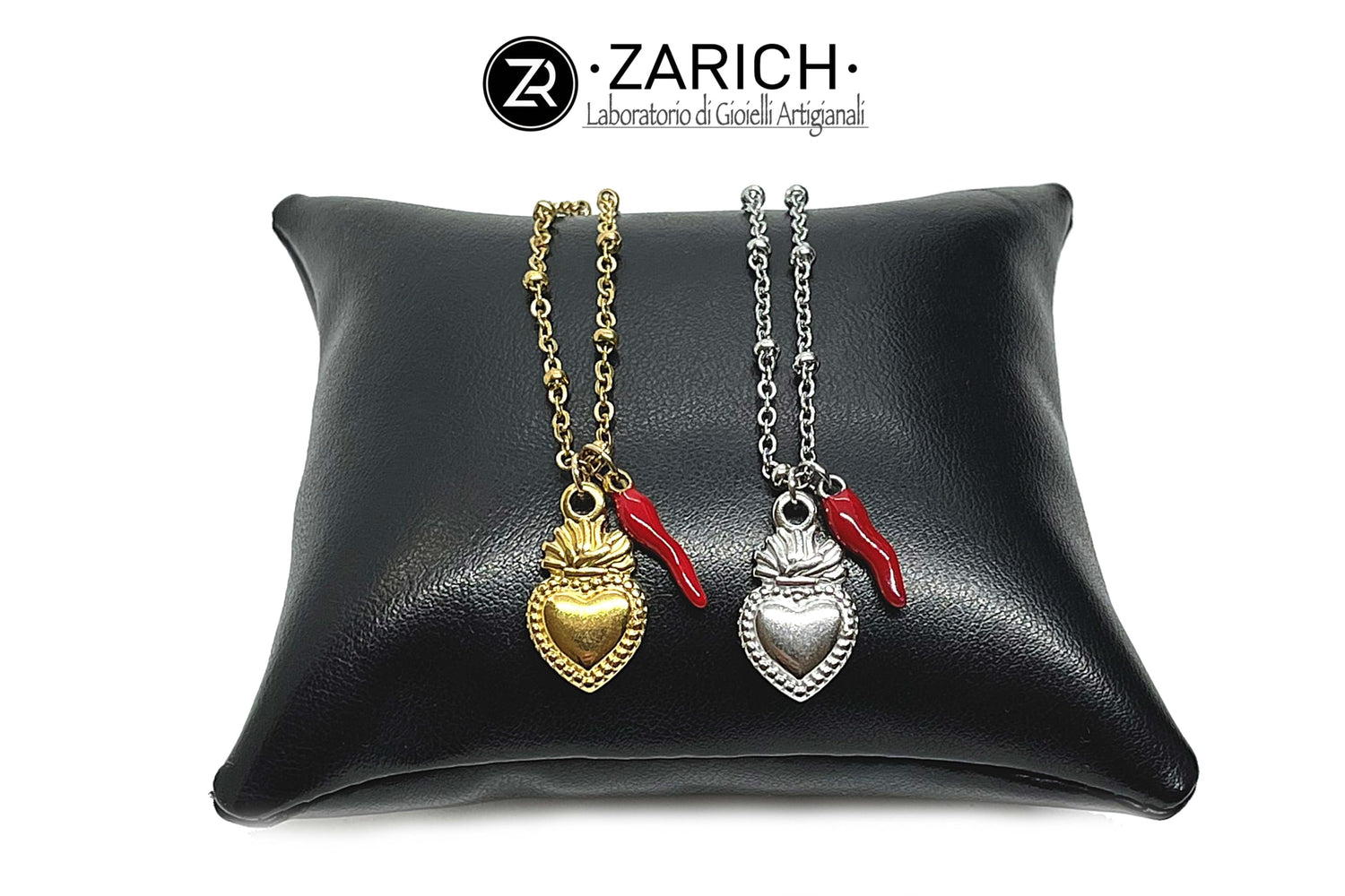 Sacred heart necklace with a little horn charm
