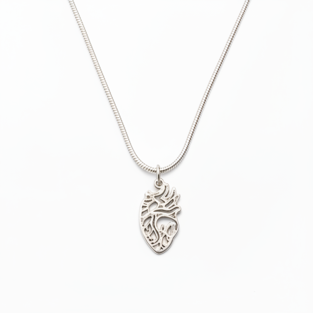 Carved anatomical heart necklace
