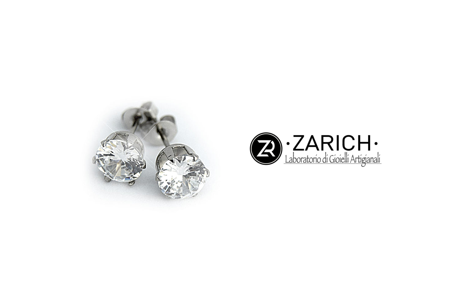 Orecchini Punto Luce Zirconi bianchi
