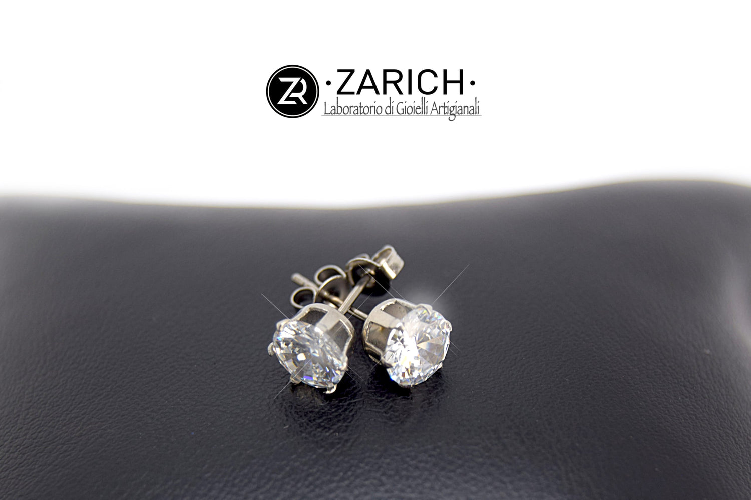 Orecchini Punto Luce Zirconi bianchi